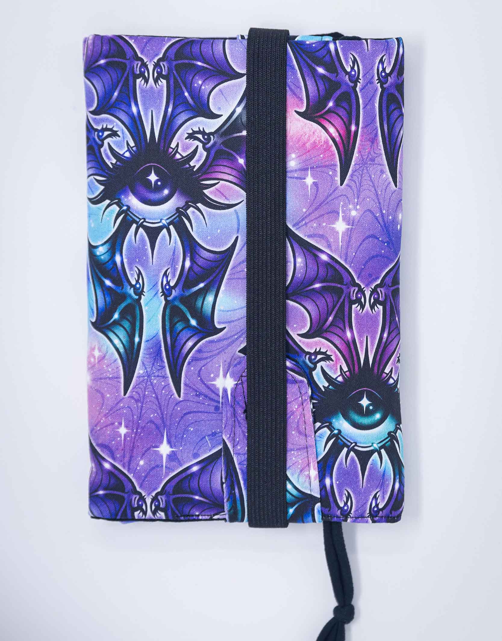 Couvre livre de poche oeil ailé